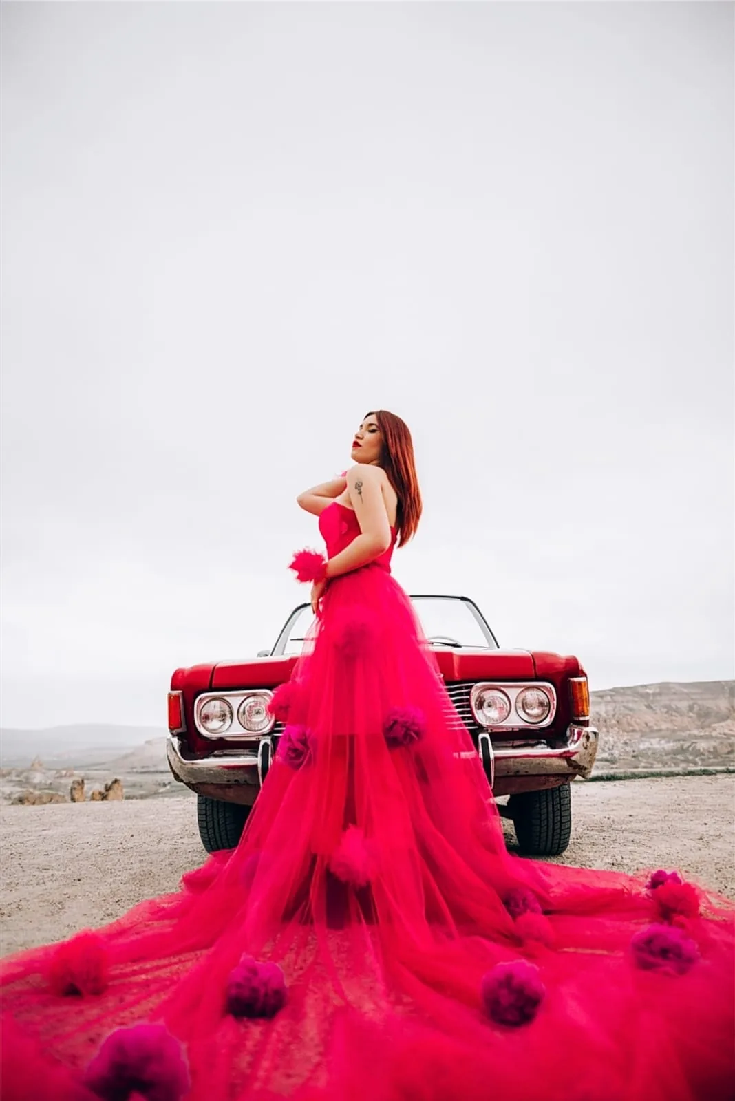 Flying dress photoshoot with a vintage car