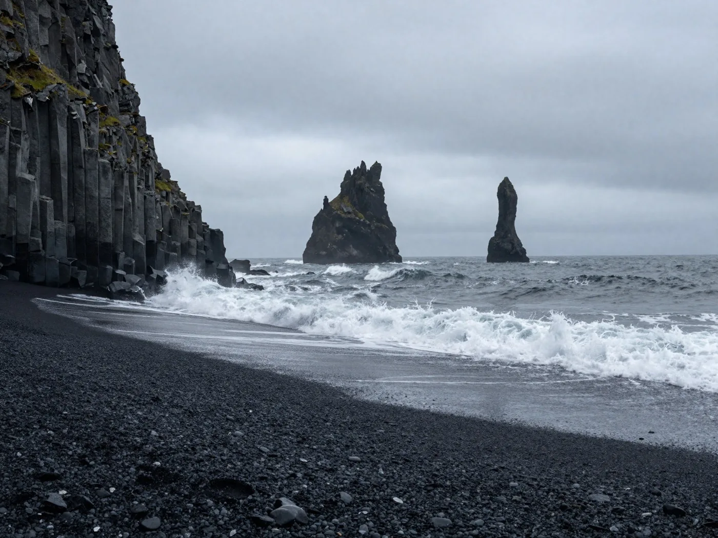 Reynisfjara black sand beach with basalt sea stacks