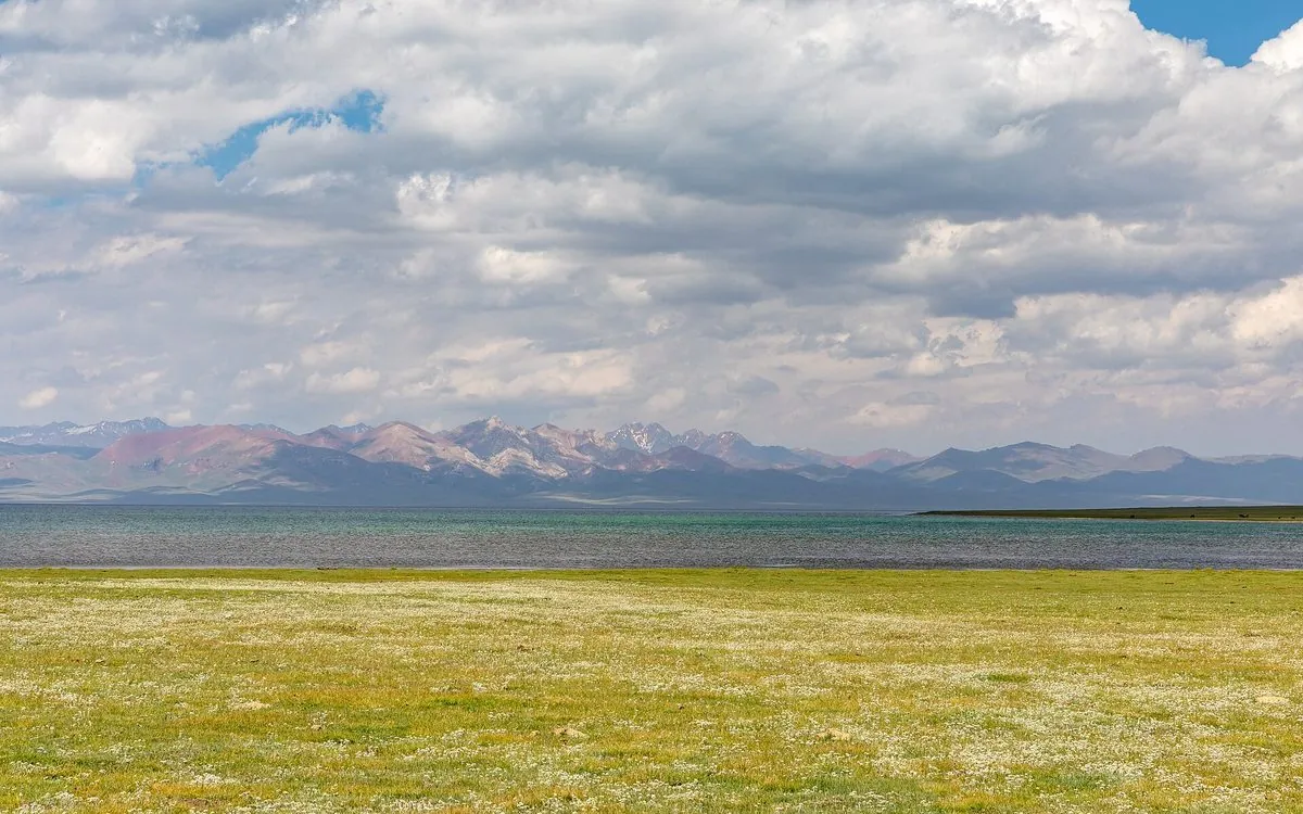 Yurt camp on the shore of Song-Kul lake at dusk